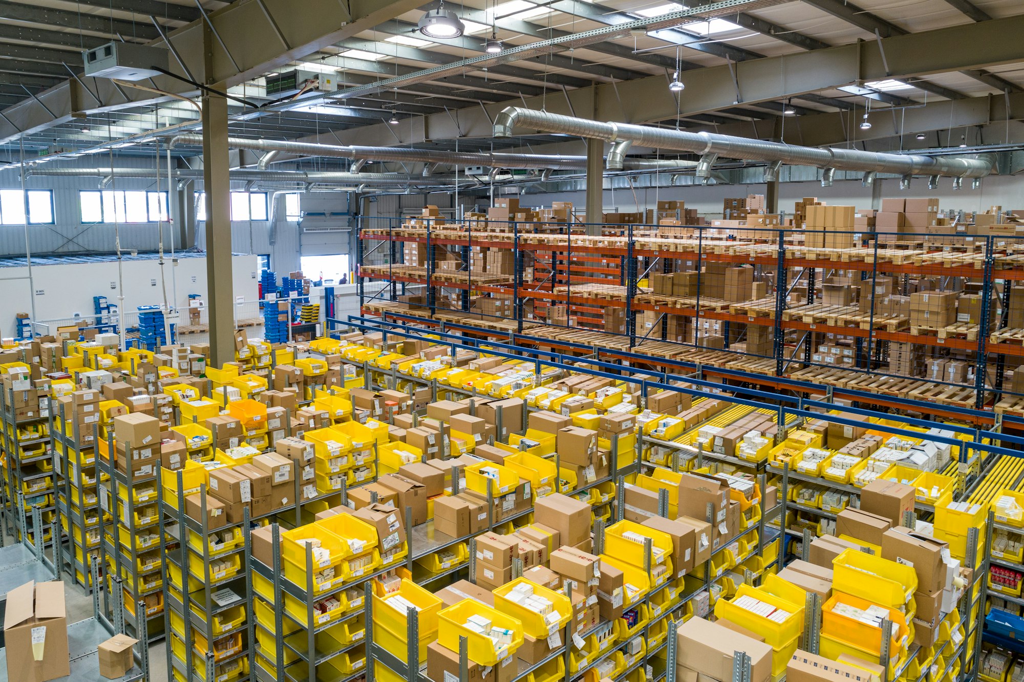Warehouse aisle with organised pallet racking